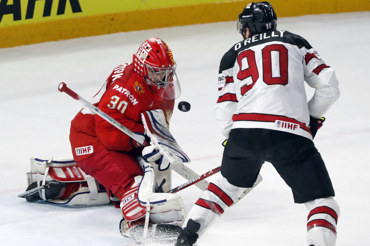 De to mest vindende nationer i historien ved VM i ishockey, Rusland og Canada, udkæmpede torsdag et dramatisk slag i VM-kvartfinalen i København. Reuters/Grigory Dukor