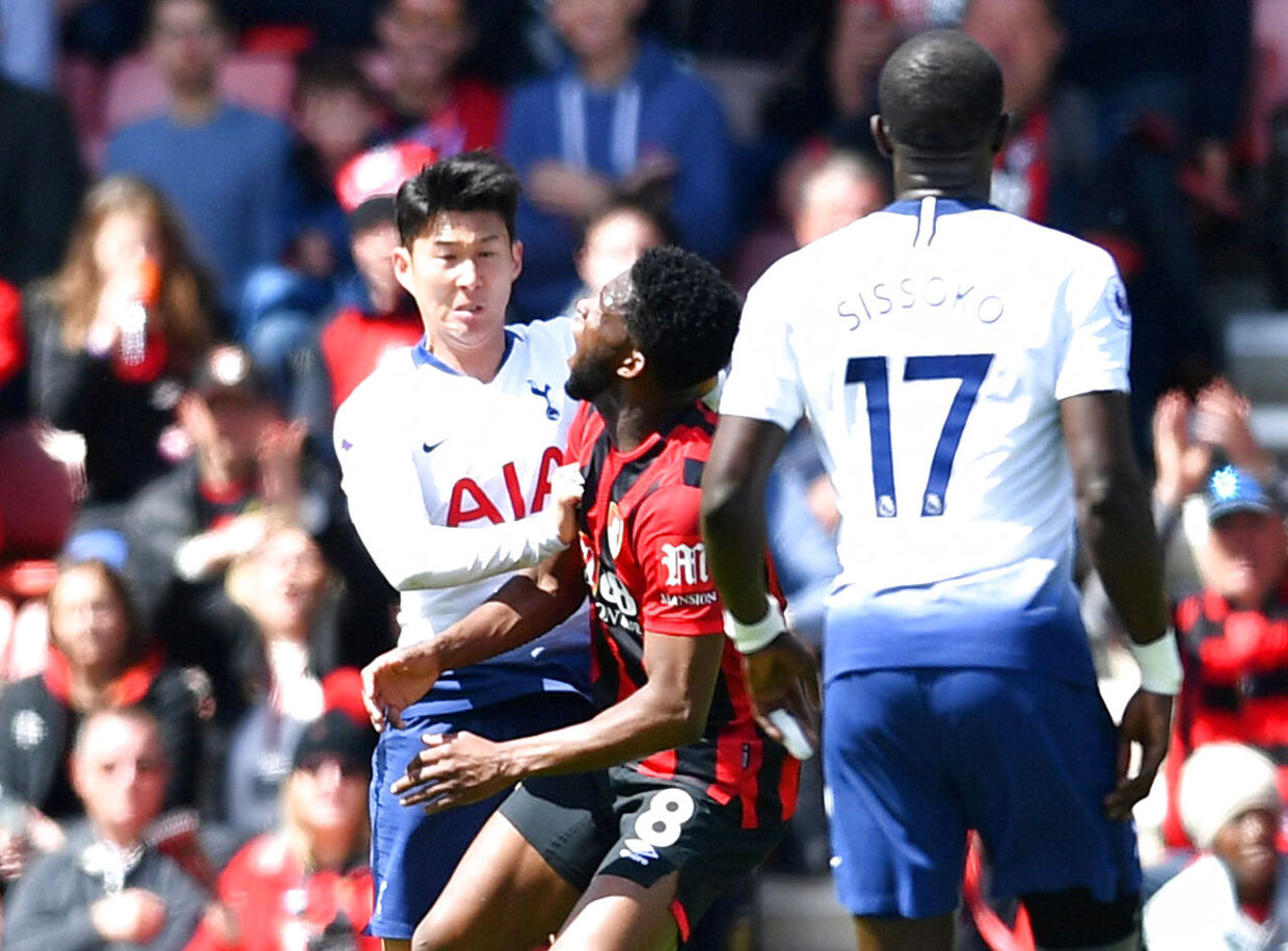 Soccer Football - Premier League - AFC Bournemouth v Tottenham Hotspur - Vitality Stadium, Bournemouth, Britain - May 4, 2019 Tottenham's Son Heung-min pushes Bournemouth's Jefferson Lerma resulting in a red card being shown REUTERS/Dylan Martinez EDITORIAL USE ONLY.No use with unauthorized audio, video, data, fixture lists, club/league logos or "live" services. Online in-match use limited to 75 images, no video emulation.No use in betting, games or single club/league/player publications. Please contact your account representative for further details.