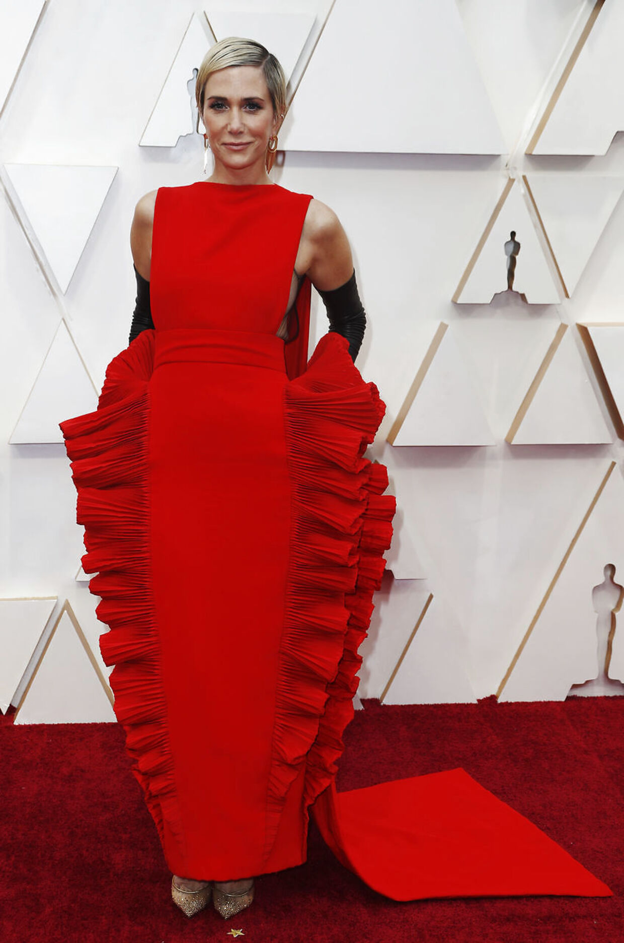 Kristen Wiigs røde kjole har fået flere seere til at tænke på lasagne.