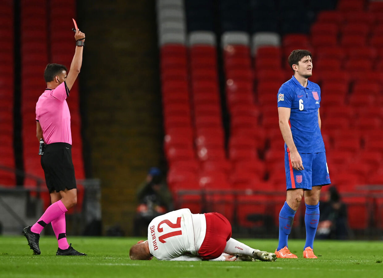 Soccer Football - UEFA Nations League - League A - Group 2 - England v Denmark - Wembley Stadium, London, Britain - October 14, 2020 England's Harry Maguire is shown a red card by referee Jesus Gil Manzano after a challenge on Denmark's Kasper Dolberg Pool via REUTERS/Daniel Leal-Olivas