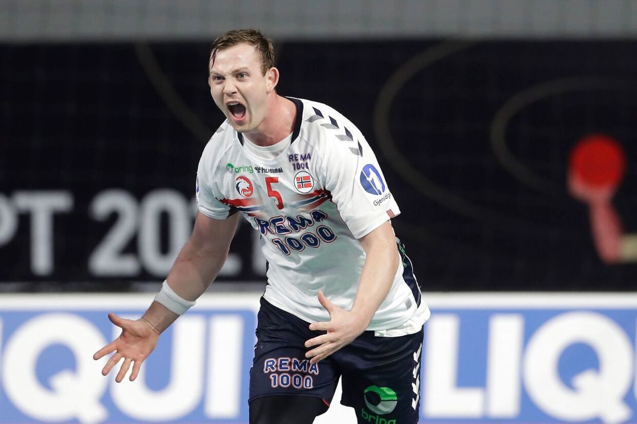 Norway's left back Sander Sagosen celebrates after scoring during the 2021 World Men's Handball Championship match between Group III teams Iceland and Norway at the 6th of October Sports Hall in 6th of October city, a suburb of the Egyptian capital Cairo on January 24, 2021. (Photo by Petr David Josek / POOL / AFP)