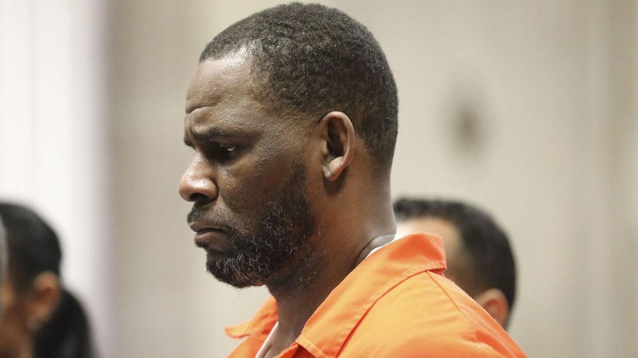Singer R. Kelly appears during a hearing at the Leighton Criminal Courthouse on September 17, 2019 in Chicago. Prior to his arrest in July over the federal indictments, Kelly had been out on bond in connection with state felony charges of aggravated sexual assault in Chicago's Cook County criminal court. Kelly has a decades-long history of abuse allegations, especially of underage girls, but for years maintained a solid fan base, performed and won awards. Antonio Perez / POOL / AFP