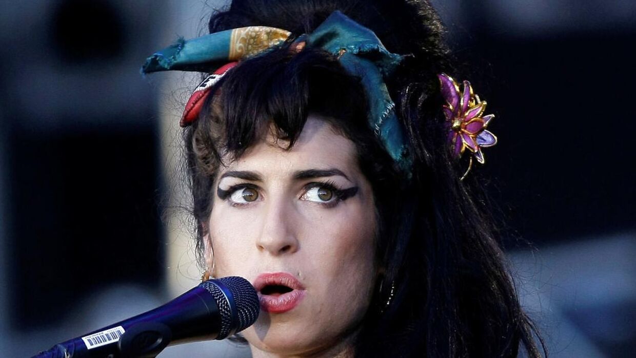 FILE PHOTO: British singer Amy Winehouse performs during the "Rock in Rio" music festival in Arganda del Rey, near Madrid July 4, 2008. REUTERS/Juan Medina/File Photo