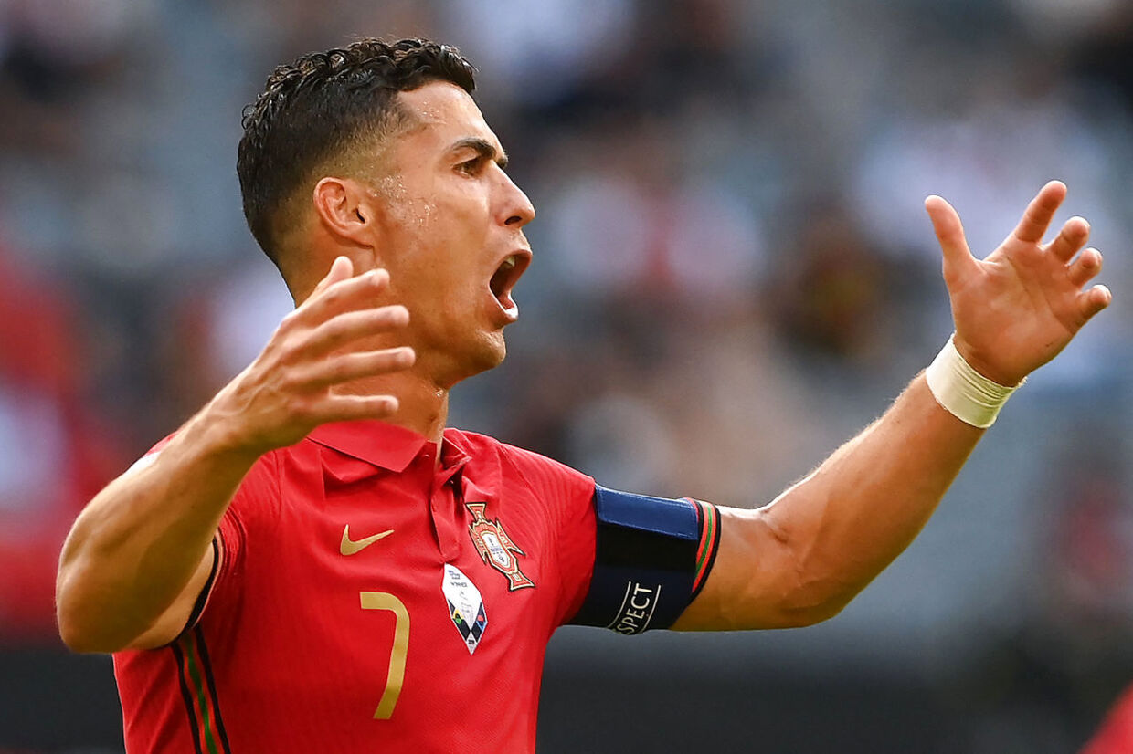 Portugal's forward Cristiano Ronaldo reacts during the UEFA EURO 2020 Group F football match between Portugal and Germany at Allianz Arena in Munich, Germany, on June 19, 2021. (Photo by CHRISTOF STACHE / POOL / AFP)