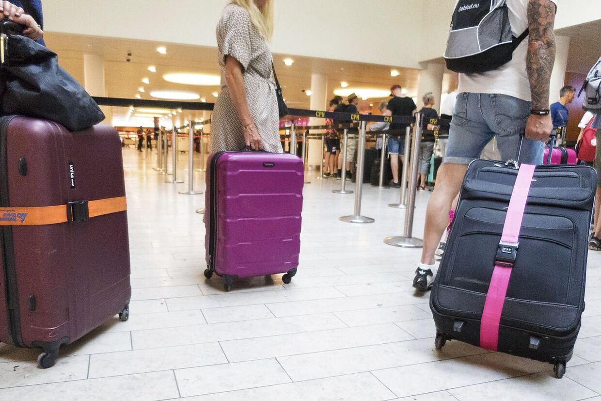 Passagerer med kufferter i Københavns Lufthavn torsdag den 18. juli 2019