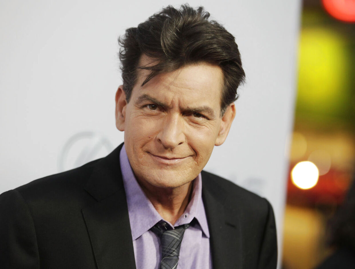 Cast member Charlie Sheen poses at the premiere of his new film "Scary Movie 5" in Hollywood, in this file photo taken April 11, 2013. Celebrity website RadarOnline.com and the National Enquirer tabloid on April 7, 2016 refused to hand over material sought by authorities investigating threats that those media reported actor Charlie Sheen had made against a former girlfriend. REUTERS/Fred Prouser/Files