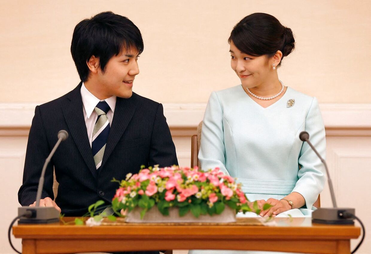 (FILES) This file picture taken on September 3, 2017 shows Japan's Princess Mako, the eldest daughter of Prince Akishino and Princess Kiko, and her fiancee Kei Komuro at a press conference to announce their engagement at the Akasaka East Residence in Tokyo. - The Imperial Household Agency said on October 1, 2021 that Princess Mako, who is the niece of Emperor Naruhito, will marry Kei Komuro on October 26, local media reported. (Photo by SHIZUO KAMBAYASHI / POOL / AFP)