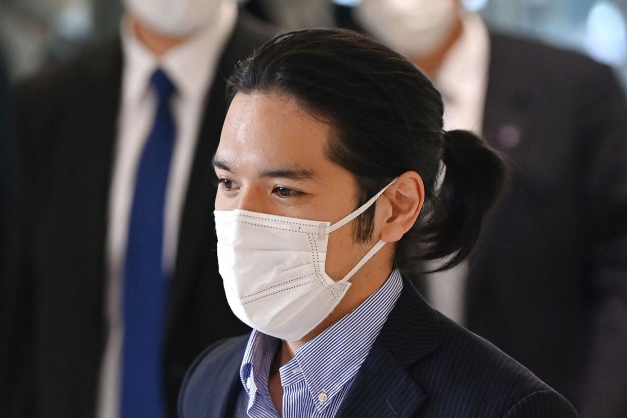 This picture taken on September 27, 2021 shows Kei Komuro, the boyfriend of Japan's Princess Mako, arriving at Narita airport in Chiba Prefecture. - The Imperial Household Agency said on October 1, 2021 that Princess Mako, who is the niece of Emperor Naruhito, will marry Kei Komuro on October 26, local media reported. (Photo by Kazuhiro NOGI / AFP)
