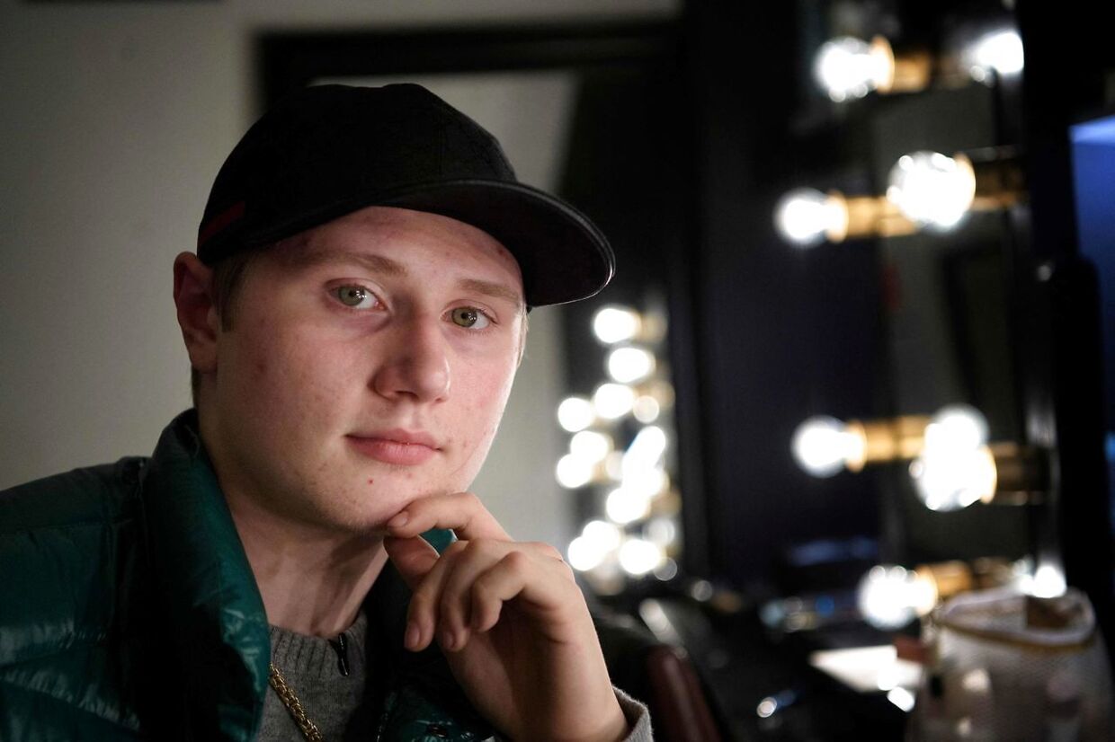 A picture taken on November 8, 2019 in Stockholm shows the Swedish rap artist Einar. - A person believed to be the Swedish rap artist Einar, officially named Nils Kurt Erik Einar Gronberg, was shot to death in the street at the Hammarby Sjostad distict in Stockholm late in the night of October 21, 2021. (Photo by Jessica GOW / TT NEWS AGENCY / AFP) / Sweden OUT