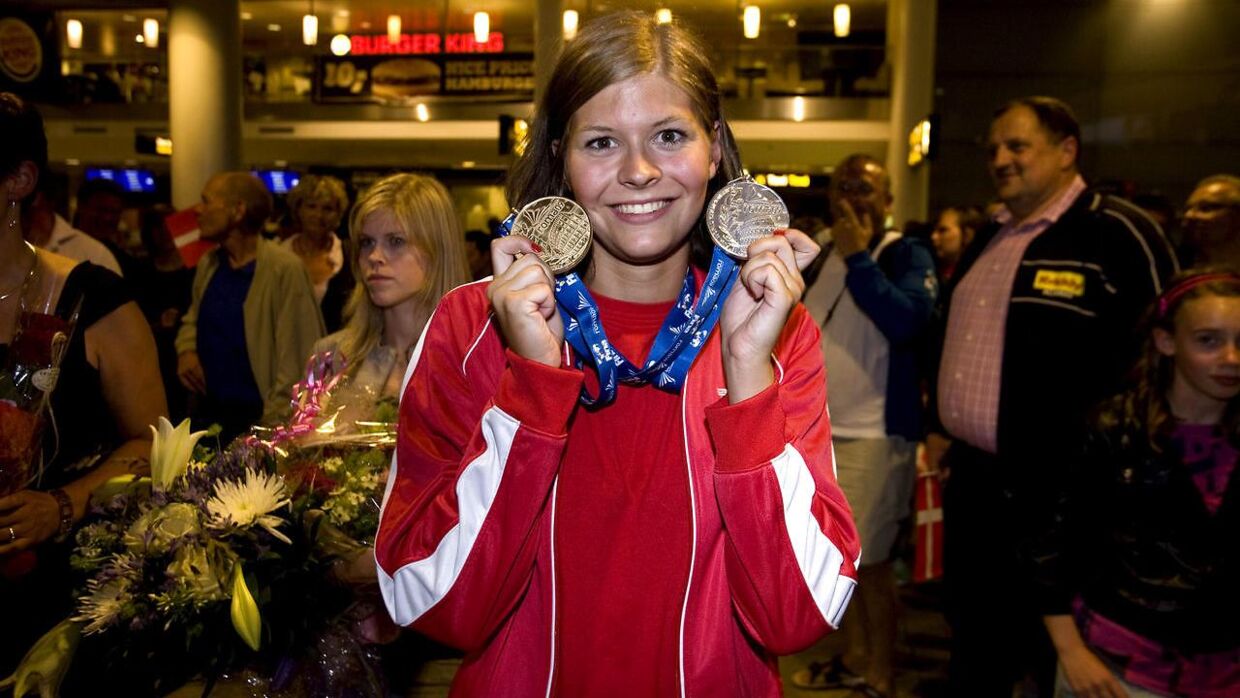 Lotte Friis med sin VM-guldmedalje i 2009.