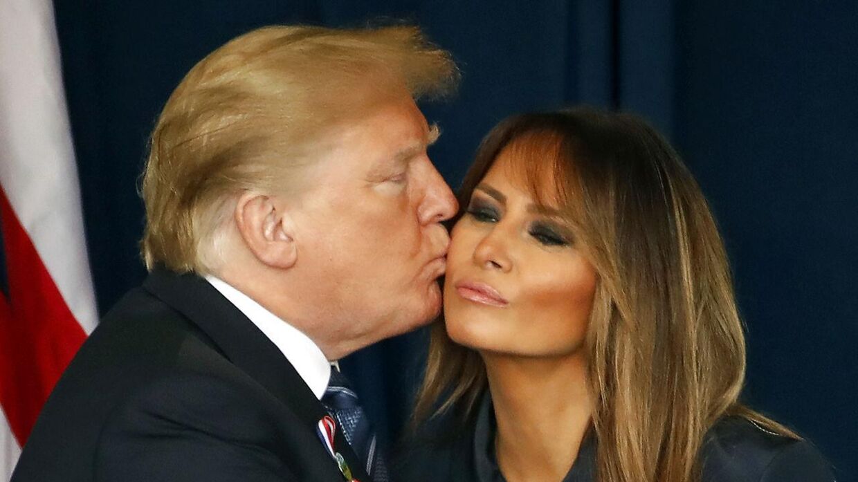 President Donald Trump kisses First Lady Melanie Trump after finishing his remarks during the September 11th Flight 93 Memorial Service in Shanksville, Pa., Tuesday, Sept. 11, 2018. (AP Photo/Gene J. Puskar)