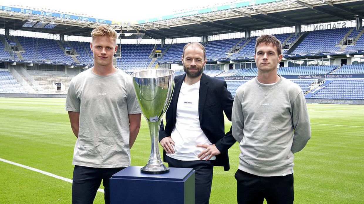 OBs Jeppe Tverskov, cheftræner Andreas Alm og anfører Jens Jakob Thomasen hungrer efter klubbens første trofæ i 15 år.