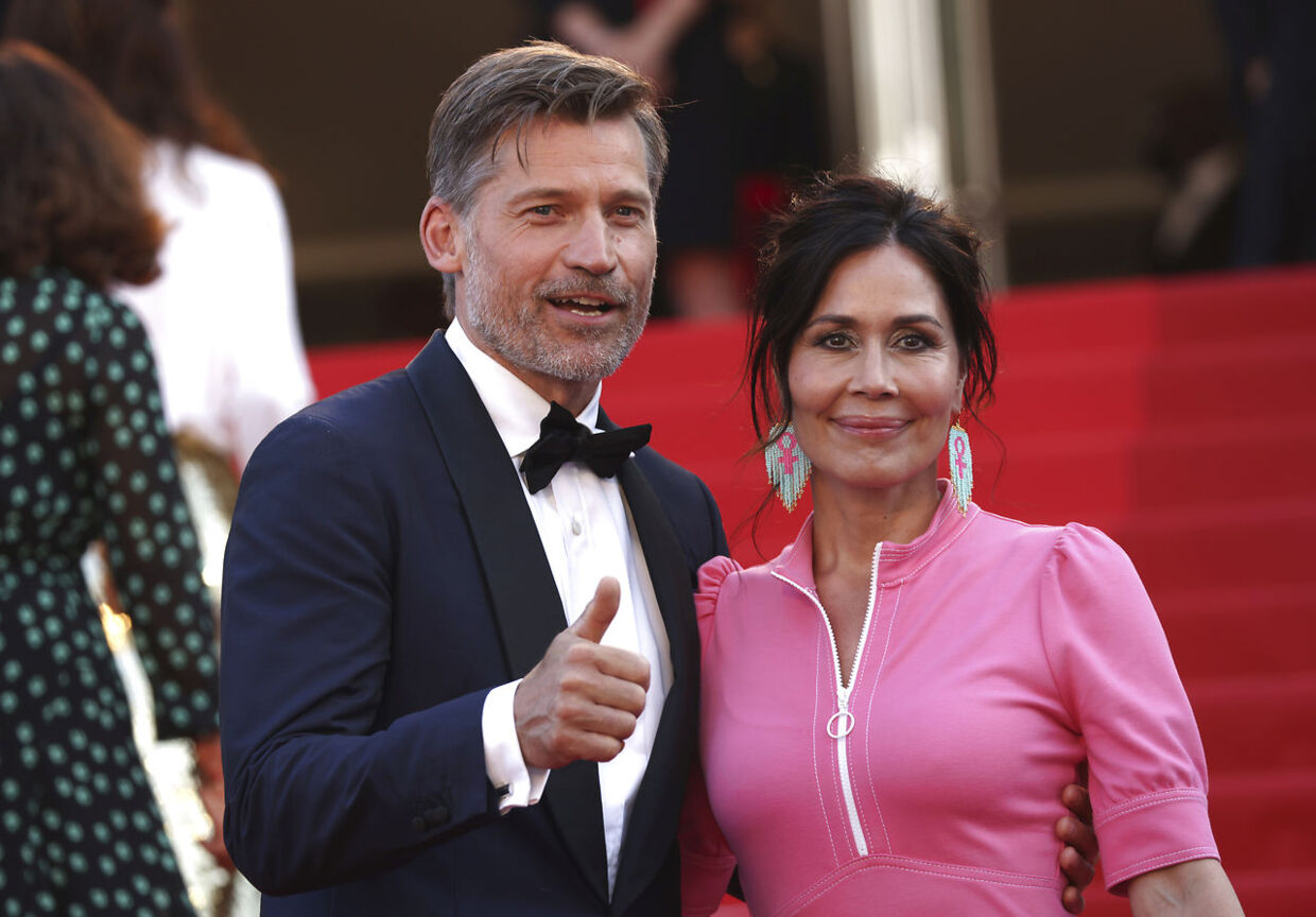 Nikolaj Coster-Waldau, left, and Nukaaka Coster-Waldau pose for photographers upon arrival at the opening ceremony and the premiere of the film 'Final Cut' at the 75th international film festival, Cannes, southern France, Tuesday, May 17, 2022. (Photo by Vianney Le Caer/Invision/AP)
