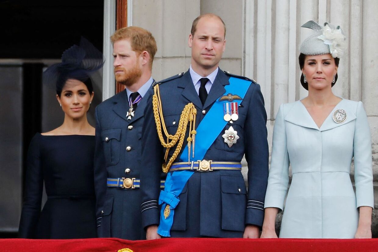 (FILES) In this file photo taken on July 10, 2018 (L-R) Britain's Meghan, Duchess of Sussex, Britain's Prince Harry, Duke of Sussex, Britain's Prince William, Duke of Cambridge and Britain's Catherine, Duchess of Cambridge, stand on the balcony of Buckingham Palace on July 10, 2018 to watch a military fly-past to mark the centenary of the Royal Air Force (RAF). - Meghan Markle has experienced remarkable highs and lows during a tumultuous period in which she married into royalty and became a mother before souring on life in Britain and returning to the United States. The 39-year-old American former television actress shot to global stardom with her engagement to Prince Harry in 2017 and their fairytale wedding six months later. She gave birth to their son, Archie, in 2019. (Photo by Tolga AKMEN / AFP)
