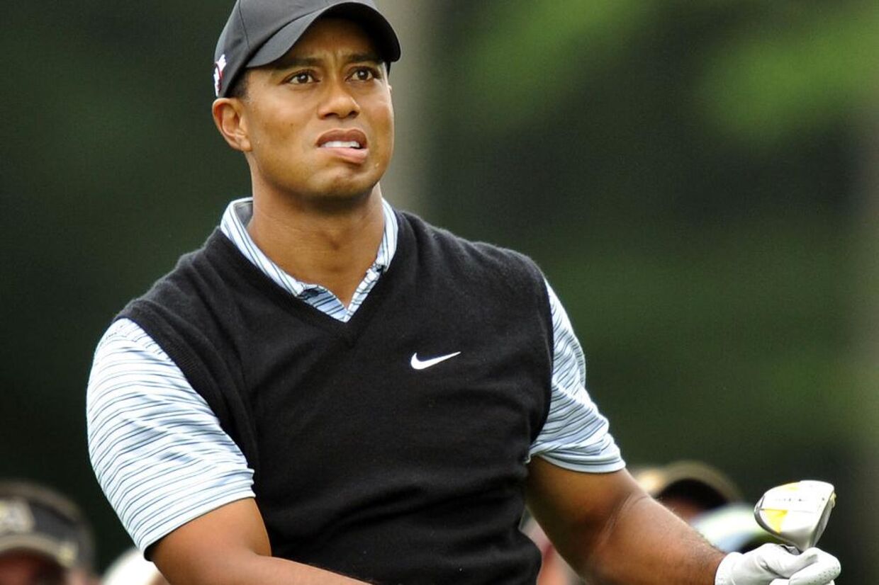 En amerikansk sportsjournalist påstår nu, at Tiger Woods fik køllebank af sin kone efter et skænderi.