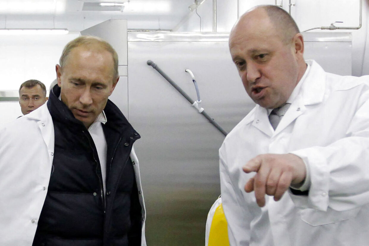 (FILES) In this file photo taken on September 20, 2010 Businessman Yevgeny Prigozhin shows Russian Prime Minister Vladimir Putin his school lunch factory outside Saint Petersburg. - Russian businessman Yevgeny Prigozhin, an ally of President Vladimir Putin, said on September 26, 2022 he had founded the Wagner mercenary group and confirmed its deployment to countries in Latin America and Africa. (Photo by Alexey DRUZHININ / SPUTNIK / AFP)