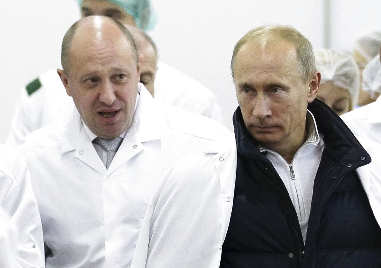 Arkivfoto af Jevgenij Prigozjin og den russiske præsident, Vladimir Putin.