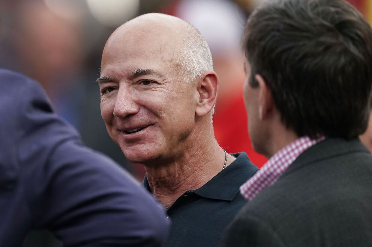 Amazon founder Jeff Bezos is seen on the sidelines before the start of an NFL football game between the Kansas City Chiefs and the Los Angeles Chargers Thursday, Sept. 15, 2022, in Kansas City, Mo. (AP Photo/Charlie Riedel)