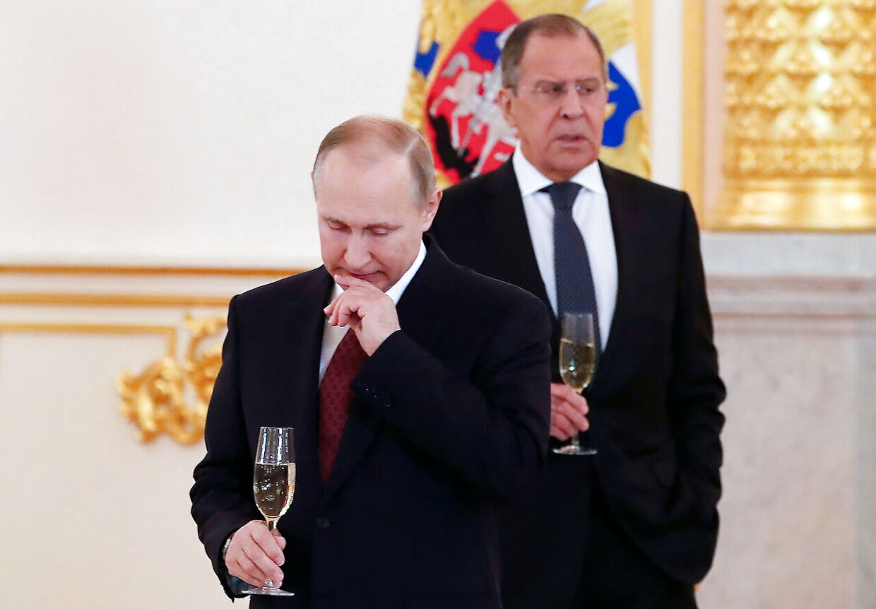 Vladimir Putin og Sergej Lavrov ved en festlig lejlighed.