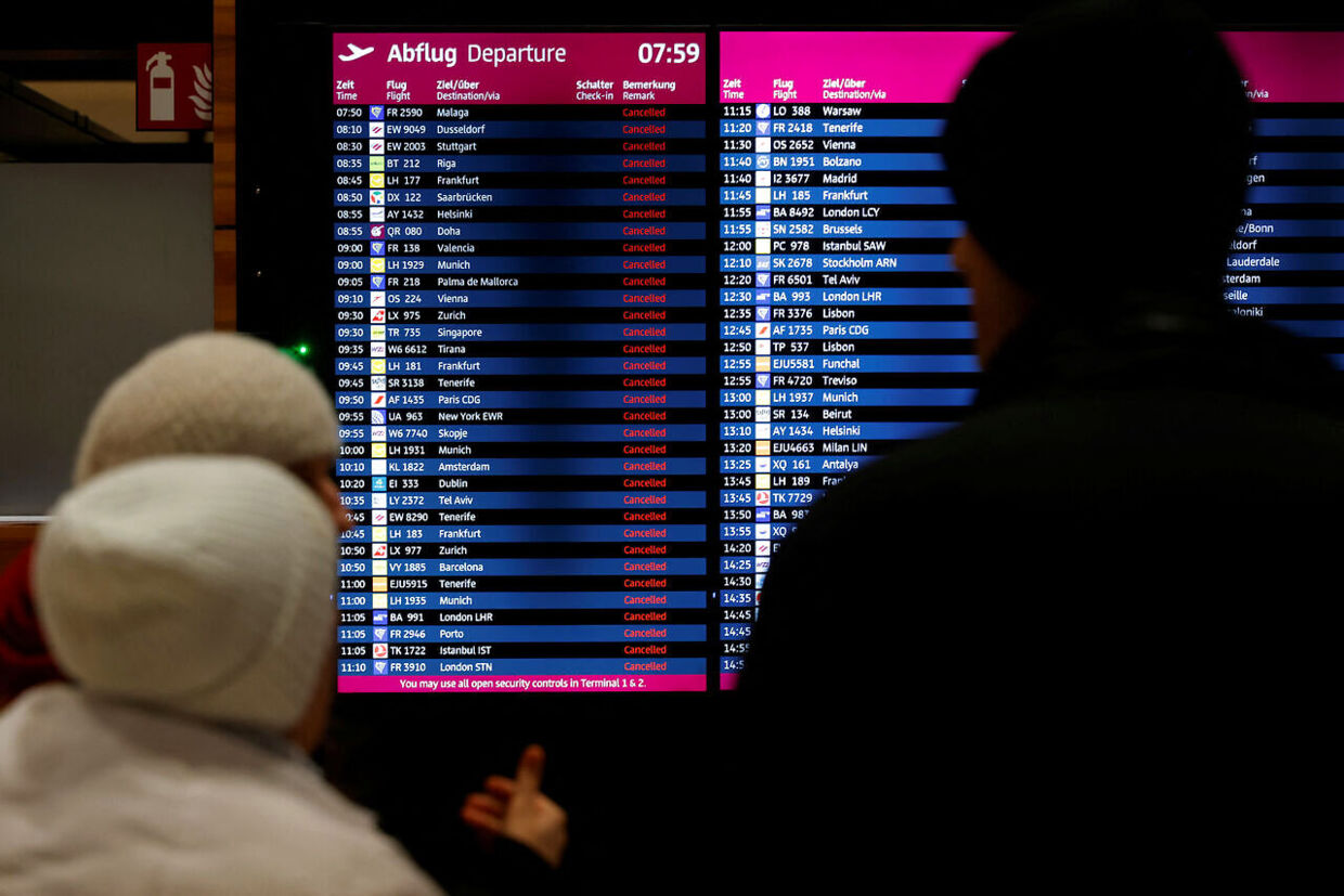 Departure panel shows canceled flights during a general strike by employees over pay demands, at the Berlin Brandenburg Airport (BER), in Schoenefeld near Berlin, Germany January 25, 2023. REUTERS/Michele Tantussi
