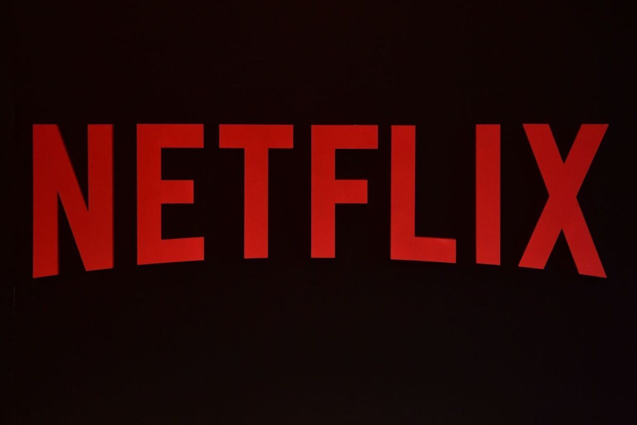 (FILES) In this file photo taken on March 01, 2017 The Netflix logo is pictured during a Netflix event on March 1, 2017 in Berlin. Netflix sacked its chief spokesman Jonathan Friedland, he revealed on Friday, June 22, 2018, after he used the N-word twice in the space of a few days during meetings with staff. / AFP PHOTO / John MACDOUGALL