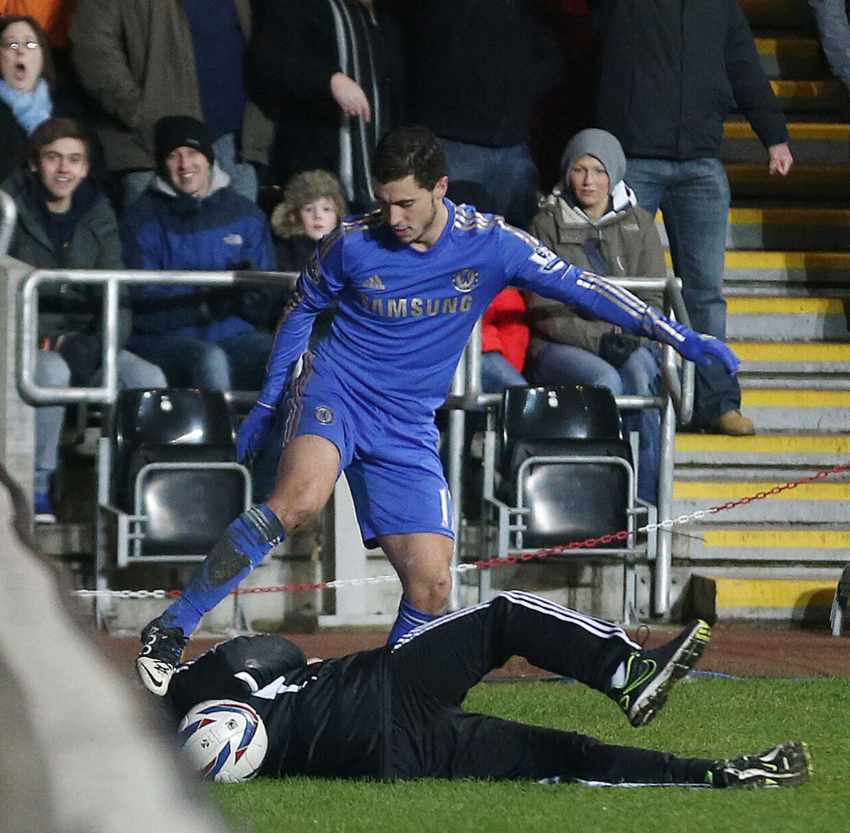 Football - Swansea City v Chelsea - Capital One Cup Semi Final Second Leg - Liberty Stadium - 23/1/13 Chelsea's Eden Hazard clashes with a ball boy during the game resulting in Hazard being later sent off Mandatory Credit: Action Images / Carl Recine Livepic