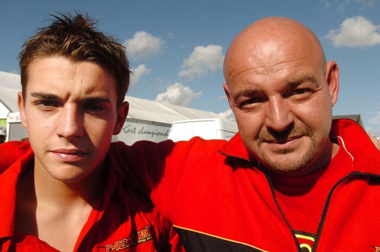 (FILES) French kart driver Jules Bianchi (L) and his father pose after the FA category race of the 2006 Karting World Championnship in Angerville, south of Paris on October 1, 2006. French Formula One driver Jules Bianchi has died from head injuries he suffered in a crash at last October's Japanese Grand Prix, his family said on July 18, 2015. AFP PHOTO JEAN AYISSI