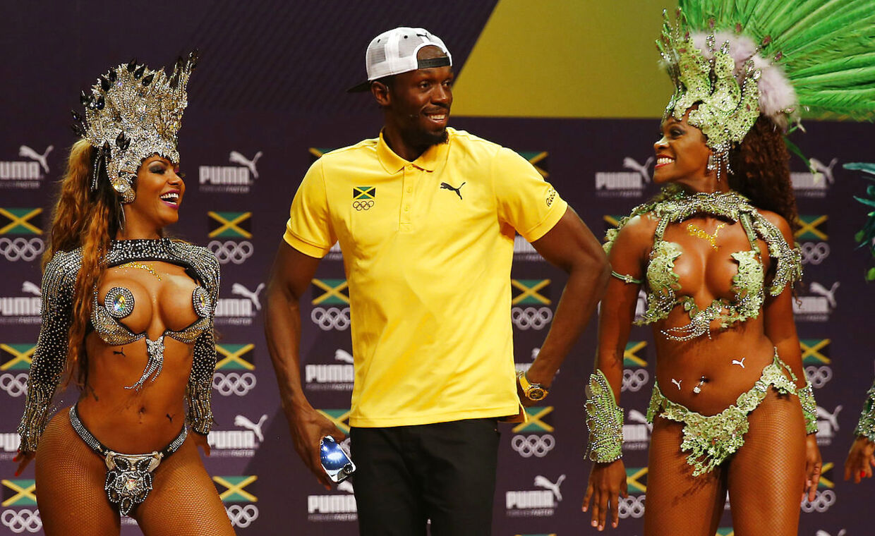2016 Rio Olympics - Athletics - Rio de Janeiro, Brazil - 08/08/2016. Usain Bolt dances samba at a press conference. REUTERS/Nacho Doce TPX IMAGES OF THE DAY