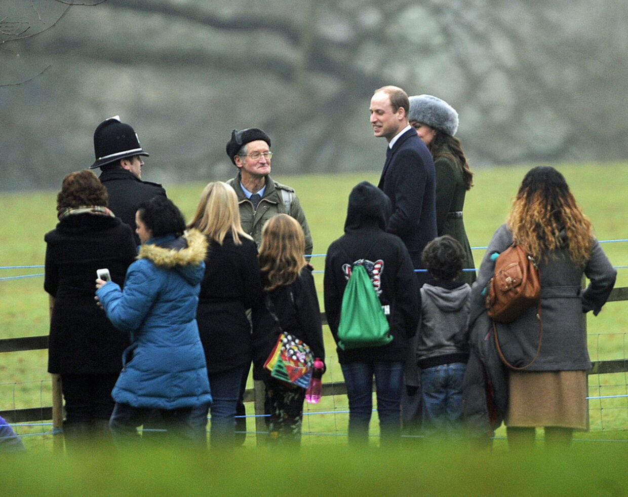 epa05704819 Prince William and his wife Kate the Duke and Duchess of Cambridge walk through the Sandringham Estate after a church service with Queen Elizabeth at St. Mary Magdalene Church in Sandringham, Norfolk 08 January 2017. The Queen has recovered from a recent illness which prevented her from attending church over Christmas. EPA/GERRY PENNY